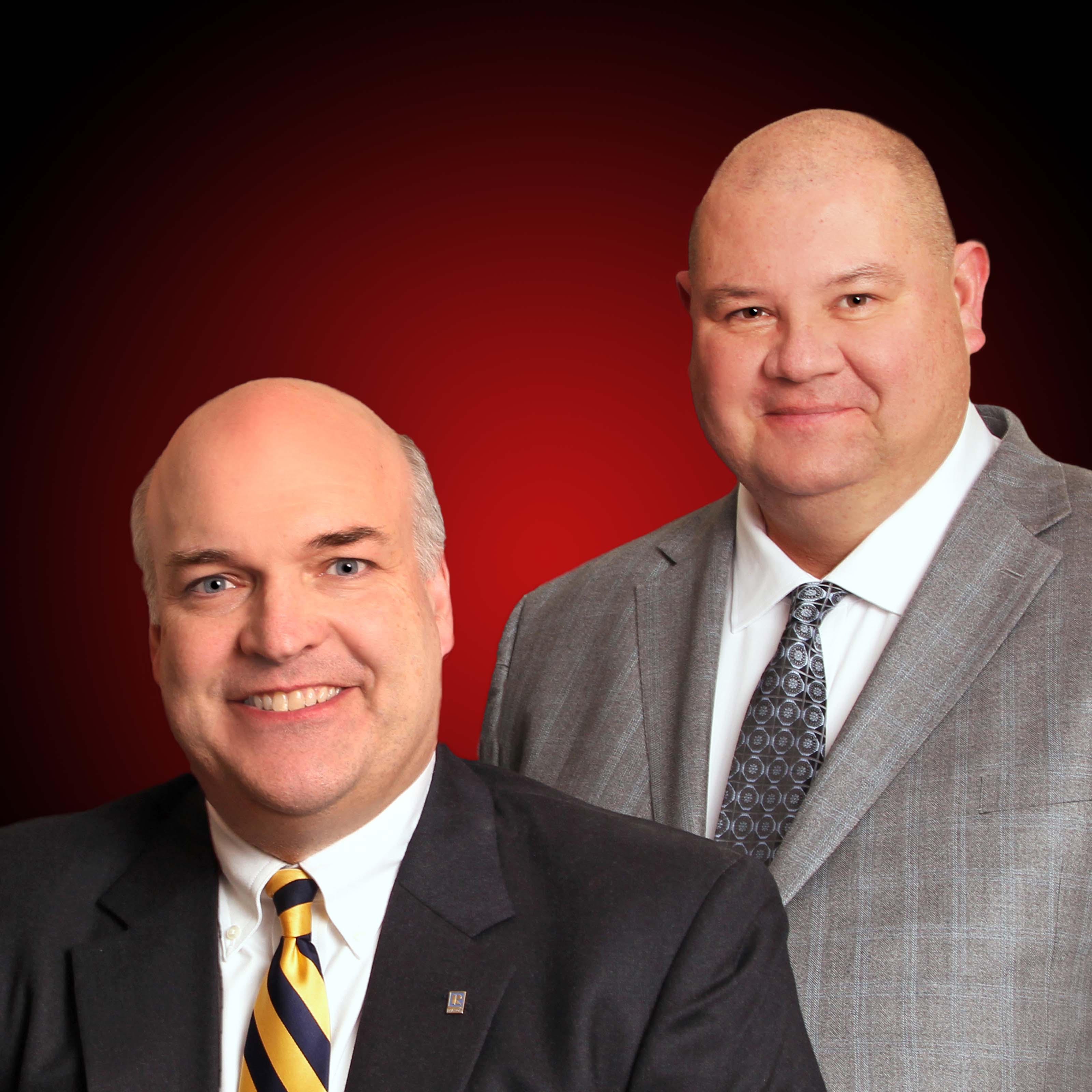Keller Williams Real Estate • Carl Adams Homes logo